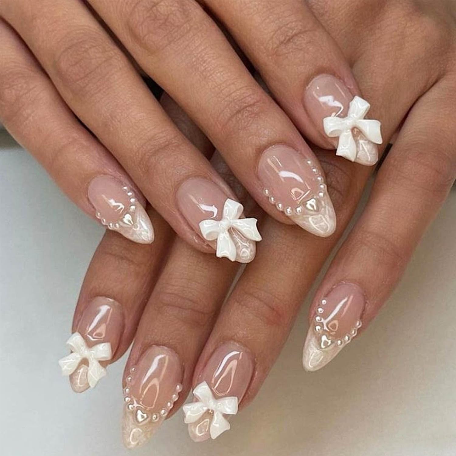 24Pcs Almond Shaped Artificial Nails - French Tips with Cute Bow Charms Design - Nude Pink Acrylic Nails for Women & Girls